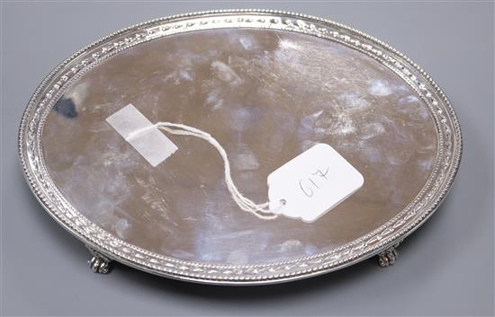 A George III silver oval stand or salver, on claw and ball feet, by Crouch and Hannam, London, 1778, 16.5 oz.